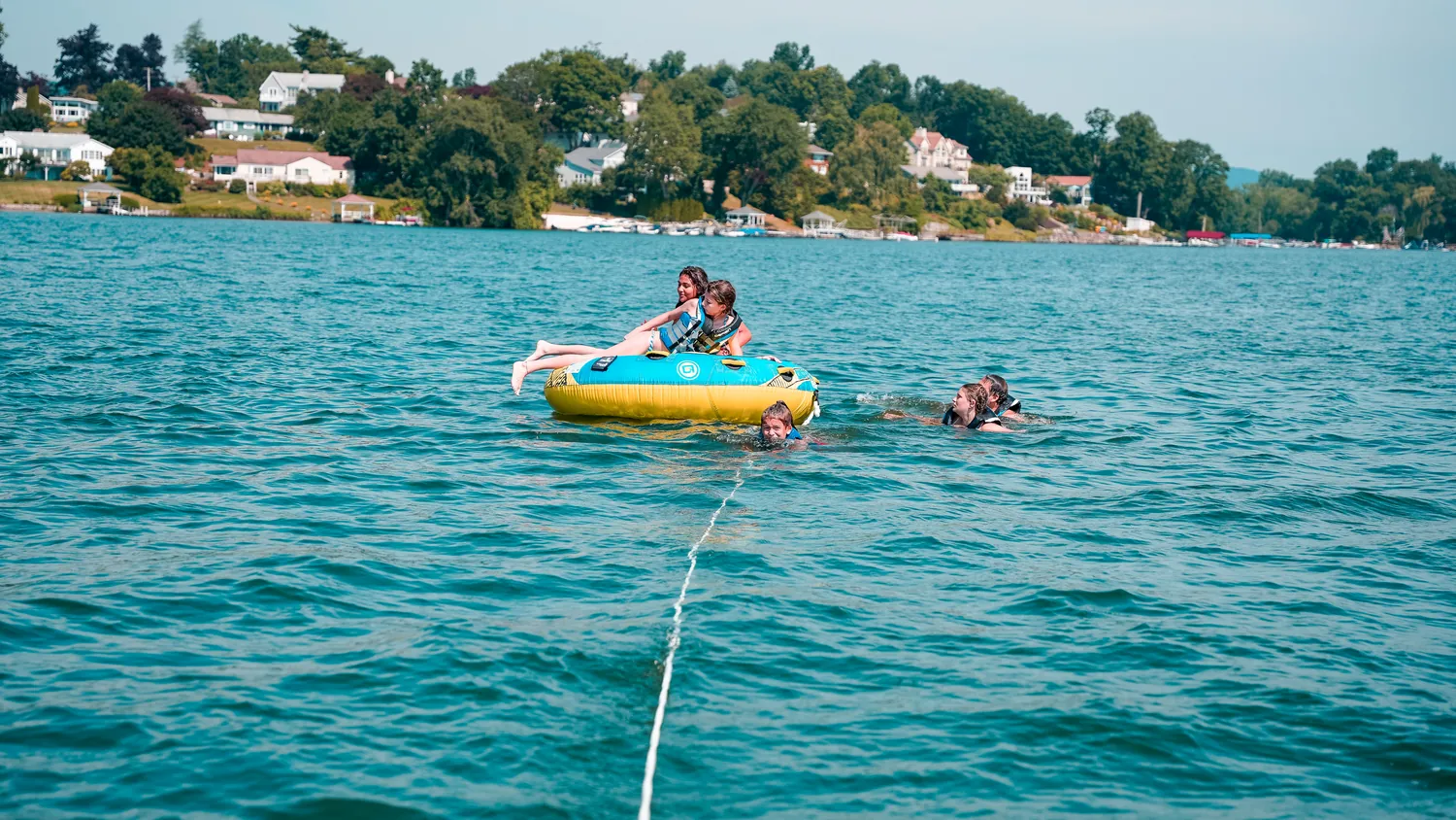 Watching the tube from the back of the boat on a custom lake day