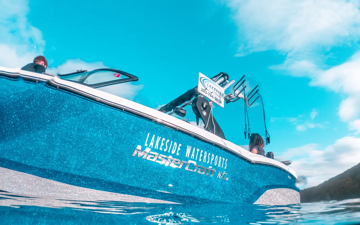 Bow of a Lakeside Watersports MasterCraft cutting across Candlewood Lake
