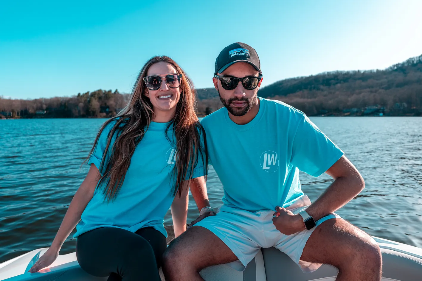 Lakeside Watersports team members on the boat in matching shirts